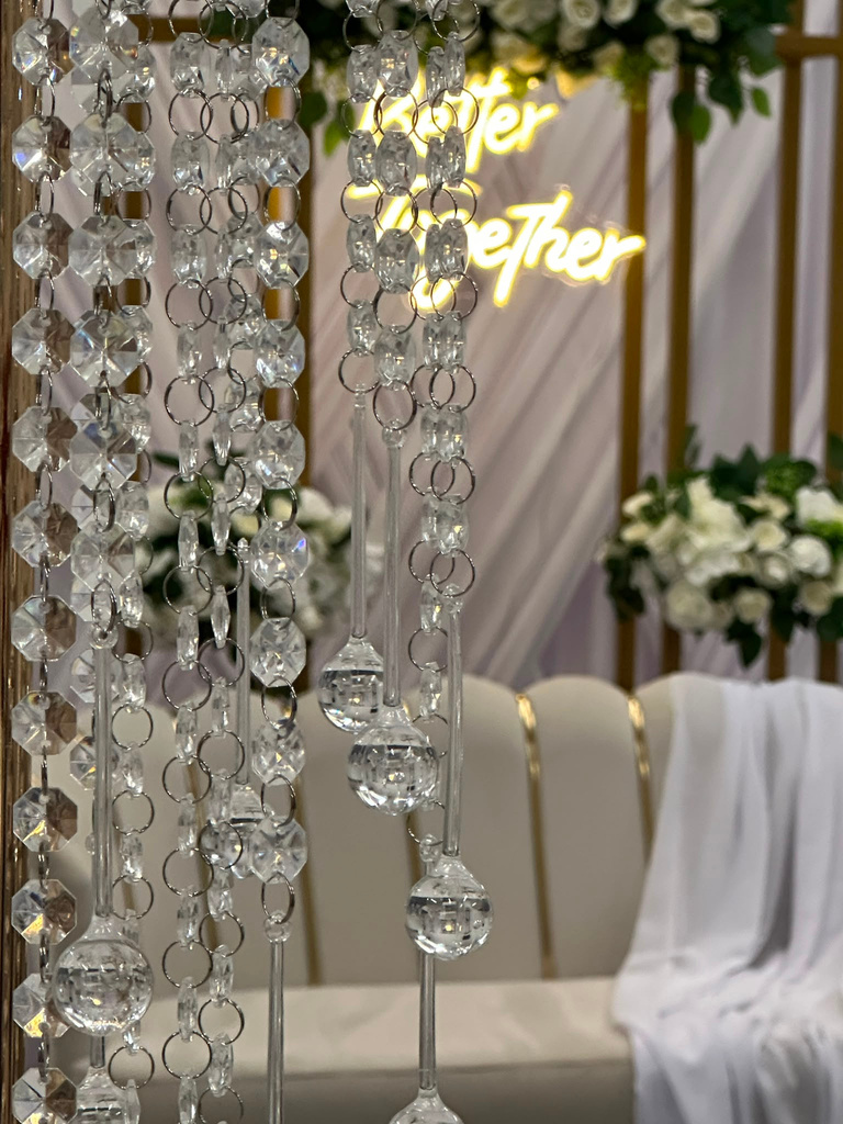 Crystal backdrop with loveseat styling